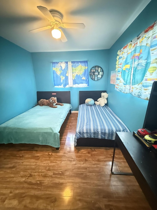 257 SW 5th St, Boca Raton, FL 33432 - bedroom featuring wood finished floors and ceiling fan