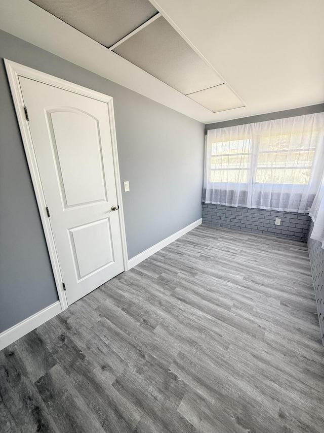 257 SW 5th St, Boca Raton, FL 33432 - empty room with wood finished floors and baseboards