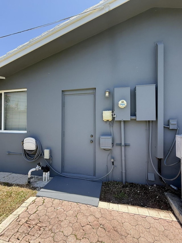 257 SW 5th St, Boca Raton, FL 33432 - property entrance with stucco siding