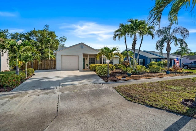 5157 Canal Cir S, Lake Worth, FL 33467 - single story home with driveway, fence, and a garage