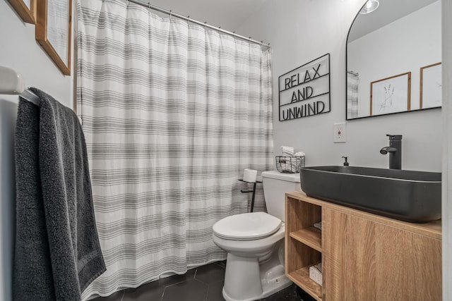 5157 Canal Cir S, Lake Worth, FL 33467 - bathroom featuring toilet, tile patterned floors, vanity, and a shower with shower curtain