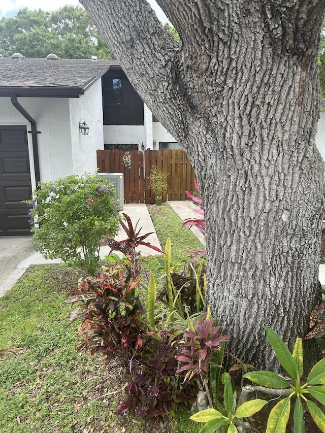2010 Colonial Rd Unit 3, Fort Pierce, FL 34950 - view of yard with central AC unit and fence