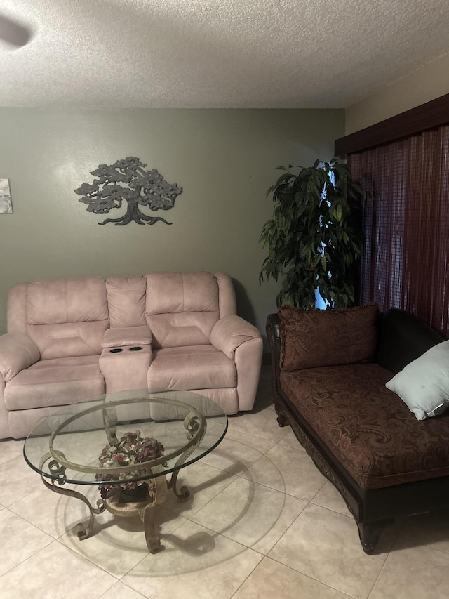 2010 Colonial Rd Unit 3, Fort Pierce, FL 34950 - living room with a textured ceiling and light tile patterned flooring