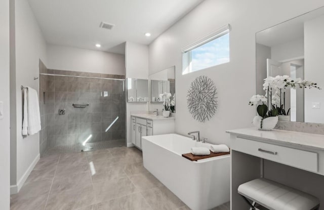 822 Hookline Cir, Loxahatchee, FL 33470 - bathroom featuring walk in shower, vanity, a soaking tub, and recessed lighting