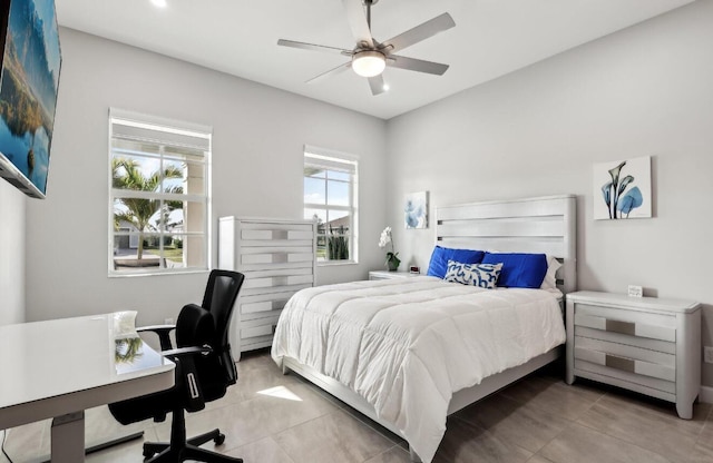 822 Hookline Cir, Loxahatchee, FL 33470 - bedroom with light tile patterned flooring, a desk, and a ceiling fan