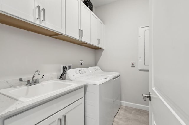 822 Hookline Cir, Loxahatchee, FL 33470 - laundry room featuring cabinet space, washer and dryer, and baseboards