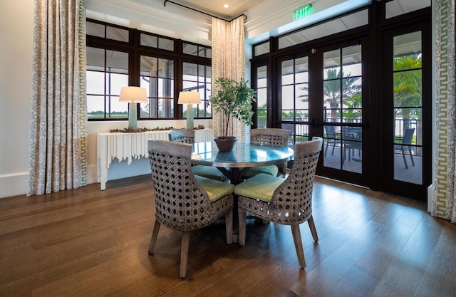 822 Hookline Cir, Loxahatchee, FL 33470 - dining space with plenty of natural light and wood finished floors