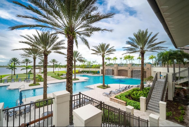 822 Hookline Cir, Loxahatchee, FL 33470 - community pool with a patio area