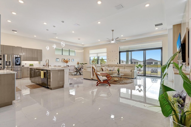 5320 Saint Armands Way, Westlake, FL 33470 - living room with a ceiling fan, recessed lighting, and light marble finish flooring