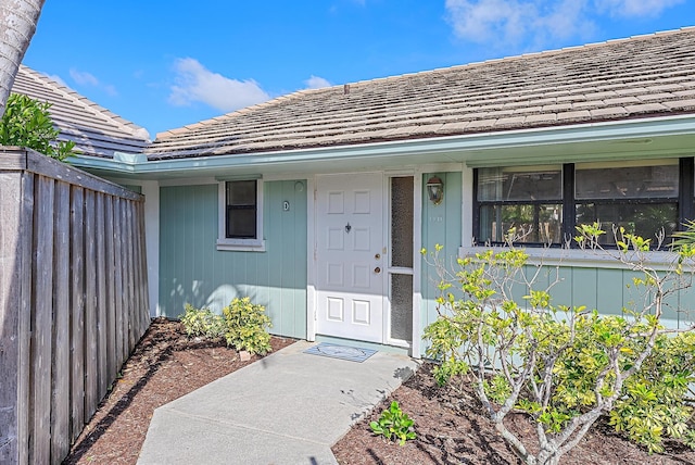 1127 E Seminole Ave Unit 14D, Jupiter, FL 33477 - property entrance featuring a tiled roof