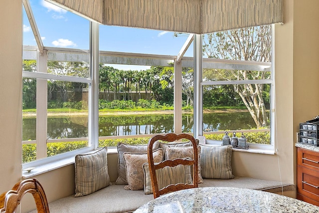 sunroom with a water view