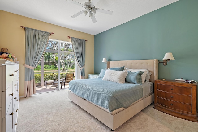 carpeted bedroom featuring access to exterior and ceiling fan