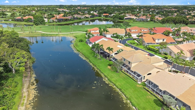 aerial perspective of suburban area with a large body of water
