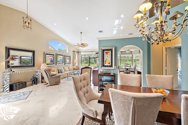 dining area with ceiling fan, crown molding, a chandelier, recessed lighting, and high vaulted ceiling
