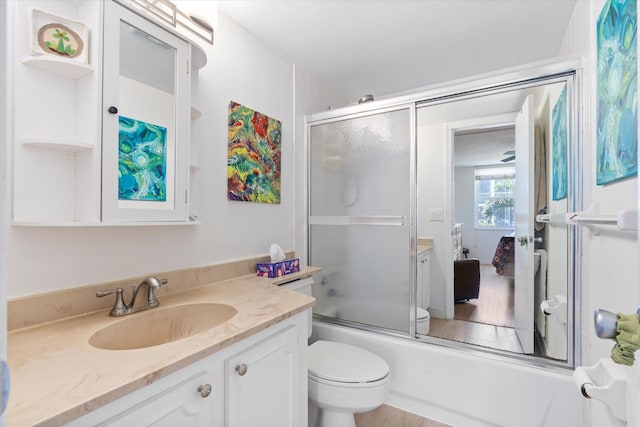 2016 S Federal Hwy Unit 206, Boynton Beach, FL 33435 - full bath featuring shower / bath combination with glass door, vanity, and toilet