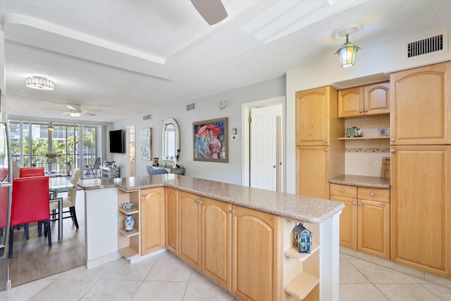 2016 S Federal Hwy Unit 206, Boynton Beach, FL 33435 - kitchen featuring open shelves, a ceiling fan, light brown cabinets, and light tile patterned floors