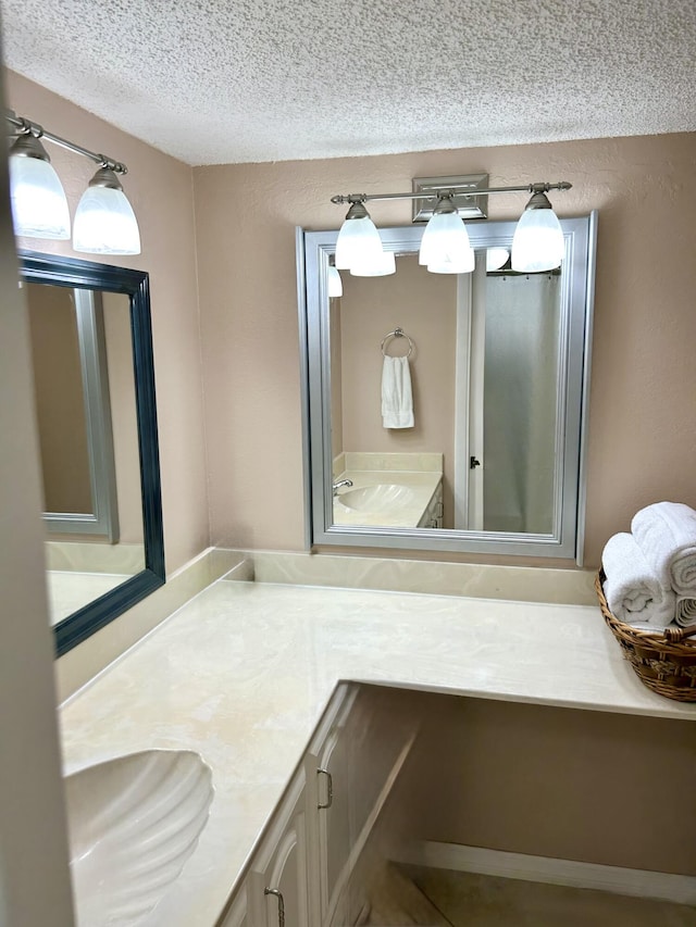 11231 Green Lake Dr Unit 104, Boynton Beach, FL 33437 - bathroom featuring vanity and a textured ceiling