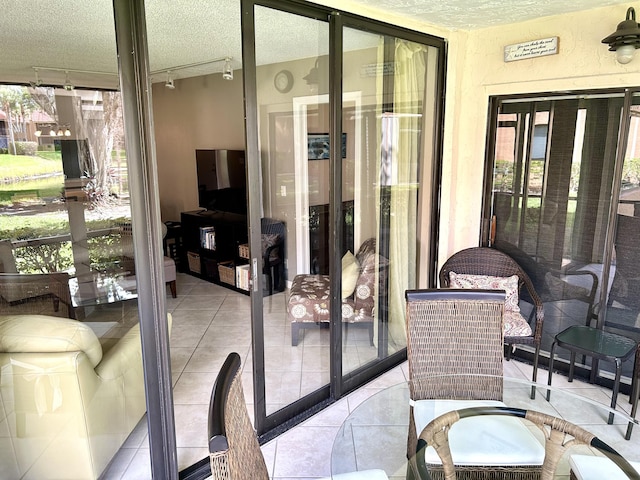 11231 Green Lake Dr Unit 104, Boynton Beach, FL 33437 - sunroom with track lighting