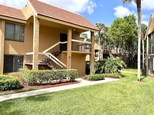11231 Green Lake Dr Unit 104, Boynton Beach, FL 33437 - view of green lawn featuring stairway