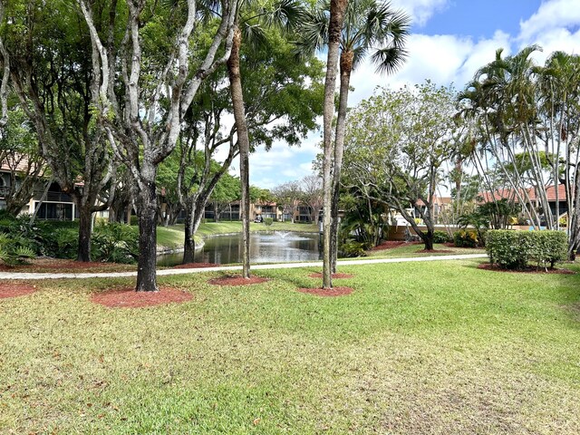 11231 Green Lake Dr Unit 104, Boynton Beach, FL 33437 - view of green lawn with a water view