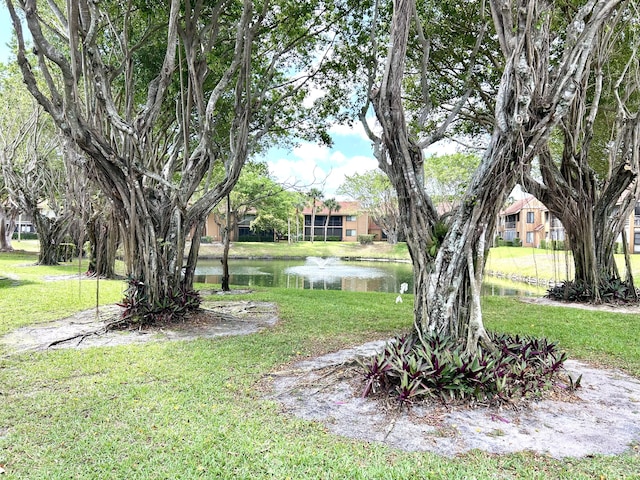 11231 Green Lake Dr Unit 104, Boynton Beach, FL 33437 - view of green lawn with a water view