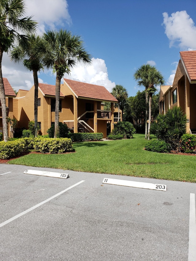 11231 Green Lake Dr Unit 104, Boynton Beach, FL 33437 - view of uncovered parking lot
