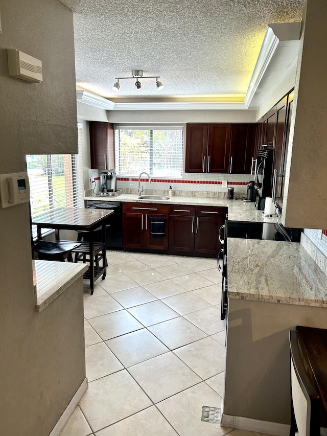 11231 Green Lake Dr Unit 104, Boynton Beach, FL 33437 - kitchen with dishwasher, a sink, a textured ceiling, light tile patterned floors, and a raised ceiling