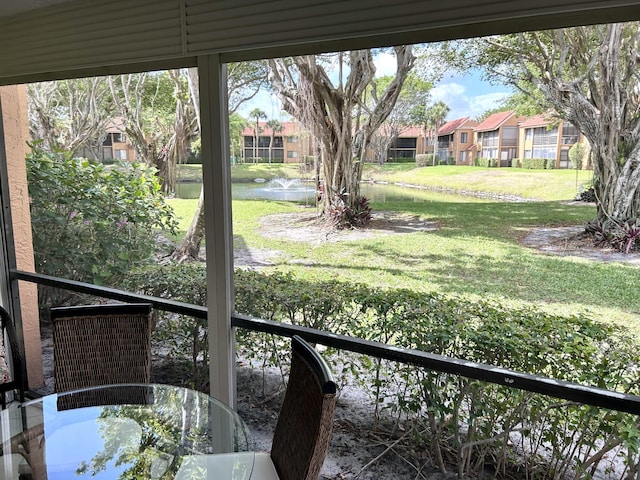 11231 Green Lake Dr Unit 104, Boynton Beach, FL 33437 - view of grassy yard with a water view and a residential view