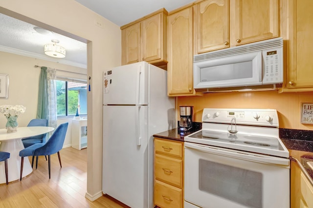 kitchen featuring white appliances, light brown cabinets, light wood-style floors, crown molding, and baseboards