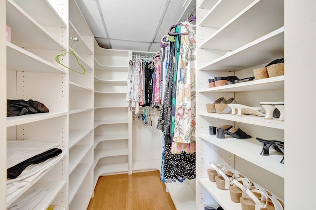 spacious closet with wood finished floors