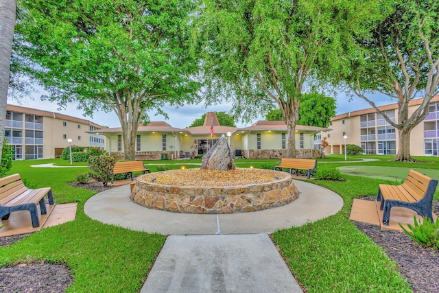 view of community featuring a yard