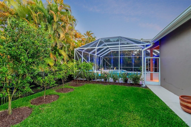 view of yard featuring a lanai