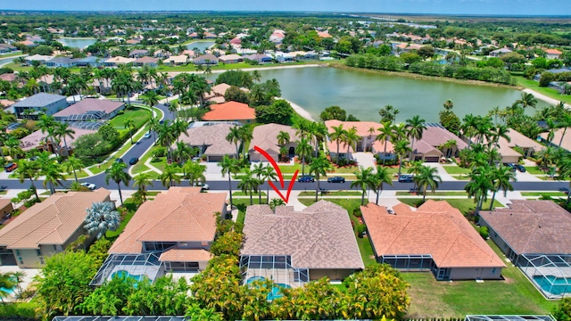 aerial perspective of suburban area featuring a large body of water