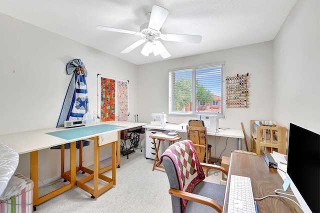 home office with light colored carpet and ceiling fan