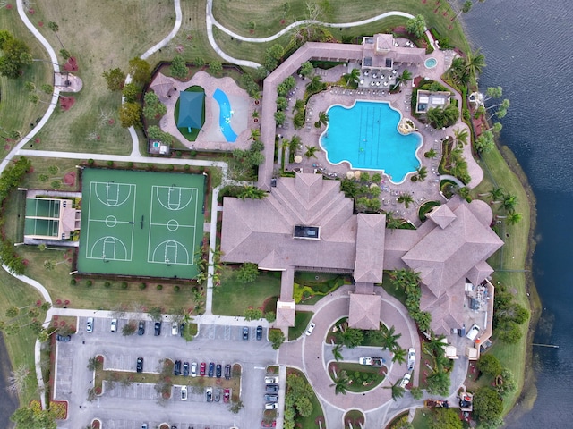 view of property location featuring a pool area