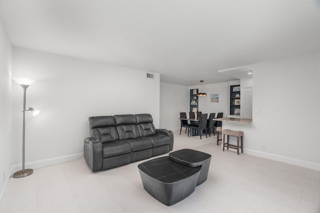 1150 NW 13th St Unit 172C, Boca Raton, FL 33486 - living room with baseboards