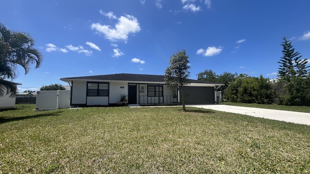 574 NW Marion Ave, Port Saint Lucie, FL 34983 - ranch-style house with concrete driveway and a garage