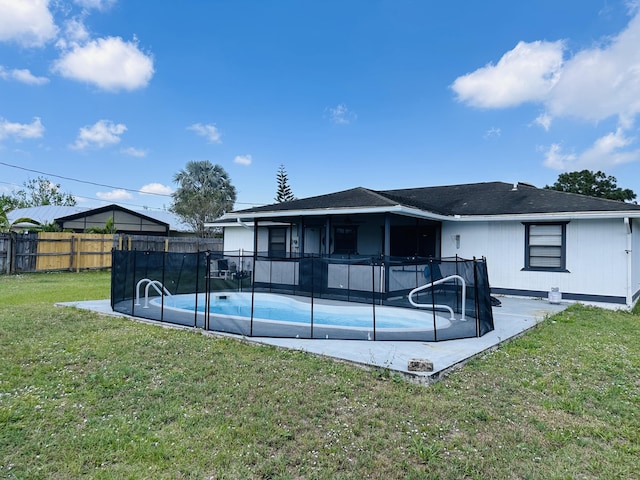 574 NW Marion Ave, Port Saint Lucie, FL 34983 - rear view of house featuring a patio area