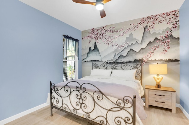 7816 Red River Rd, West Palm Beach, FL 33411 - bedroom featuring light wood-type flooring, baseboards, and a ceiling fan