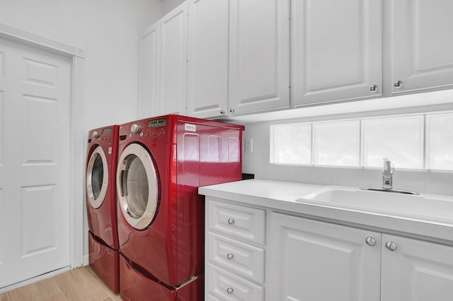 7816 Red River Rd, West Palm Beach, FL 33411 - clothes washing area with cabinet space and washer and clothes dryer