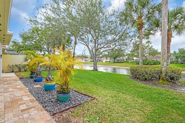 7816 Red River Rd, West Palm Beach, FL 33411 - view of green lawn featuring a water view