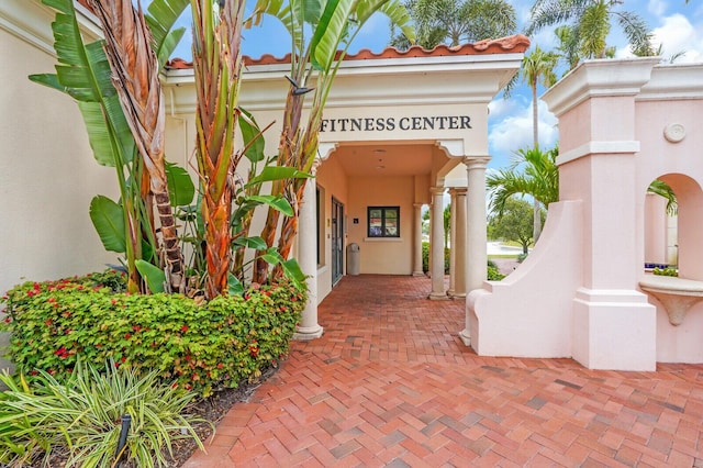 7816 Red River Rd, West Palm Beach, FL 33411 - property entrance featuring stucco siding and a tile roof
