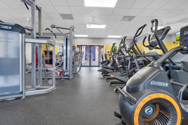 7816 Red River Rd, West Palm Beach, FL 33411 - exercise room with a paneled ceiling
