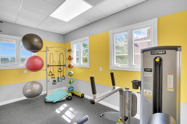 7816 Red River Rd, West Palm Beach, FL 33411 - workout room with baseboards and a drop ceiling