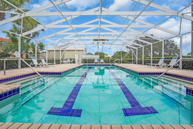 7816 Red River Rd, West Palm Beach, FL 33411 - outdoor pool with a patio and a lanai