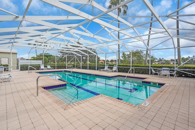 7816 Red River Rd, West Palm Beach, FL 33411 - swimming pool featuring a patio and a lanai