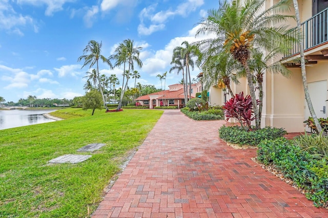 7816 Red River Rd, West Palm Beach, FL 33411 - surrounding community featuring a water view and a yard