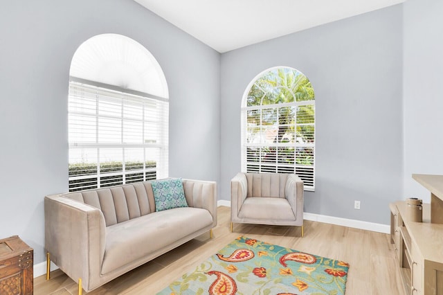 7816 Red River Rd, West Palm Beach, FL 33411 - sitting room with light wood-style floors and baseboards