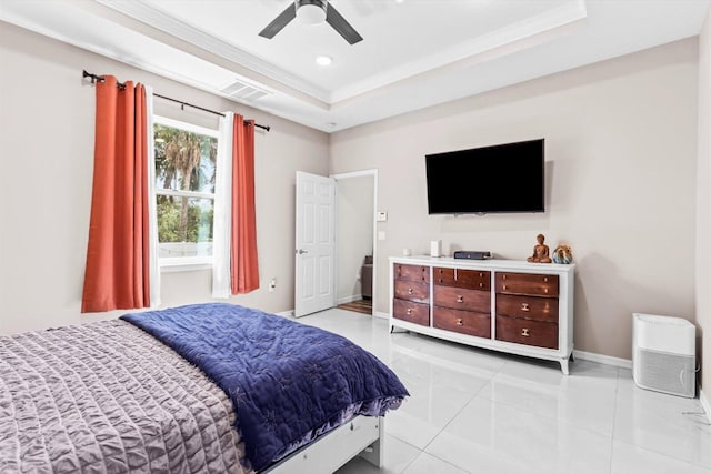 2509 SW Kenilworth St, Port Saint Lucie, FL 34953 - bedroom featuring a tray ceiling, crown molding, baseboards, a ceiling fan, and light tile patterned floors