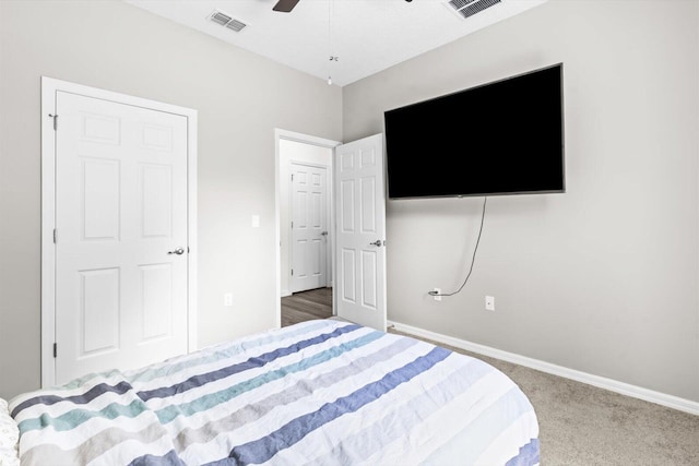 2509 SW Kenilworth St, Port Saint Lucie, FL 34953 - carpeted bedroom with baseboards and a ceiling fan